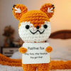 Handmade crochet fox doll with orange and white fur, holding a card that reads Positive fox stay foxy stay fabulous.