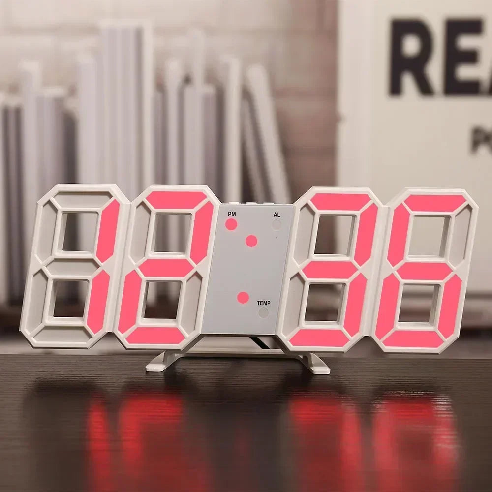 ساعة حائط رقمية بيضاء تعرض 88:88 بأرقام LED وردية ولوحة منفصلة للساعة والحرارة.