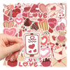 A hand holds a sheet of pink and red love-themed decorative stickers featuring hearts, guitars, and other symbols.