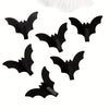 A set of five black gothic bat adhesive hooks for keys and bags.