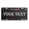A black license plate sign with the word TEXAS and space for custom text, featuring a US flag and state star graphics.