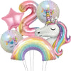 A bunch of iridescent foil balloons shaped like the number 2 and a unicorn, featuring rainbow colors.