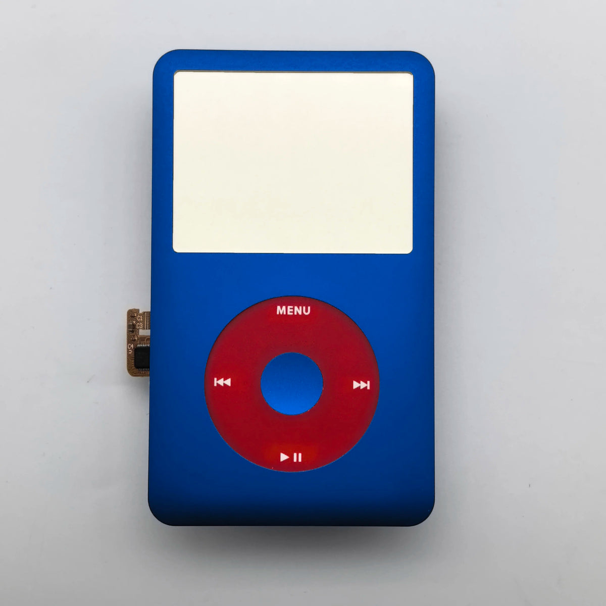 A blue iPod with a blank white front faceplate and a red clickwheel visible.