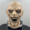 A realistic demon latex mask featuring wrinkled skin and sharp teeth for Halloween