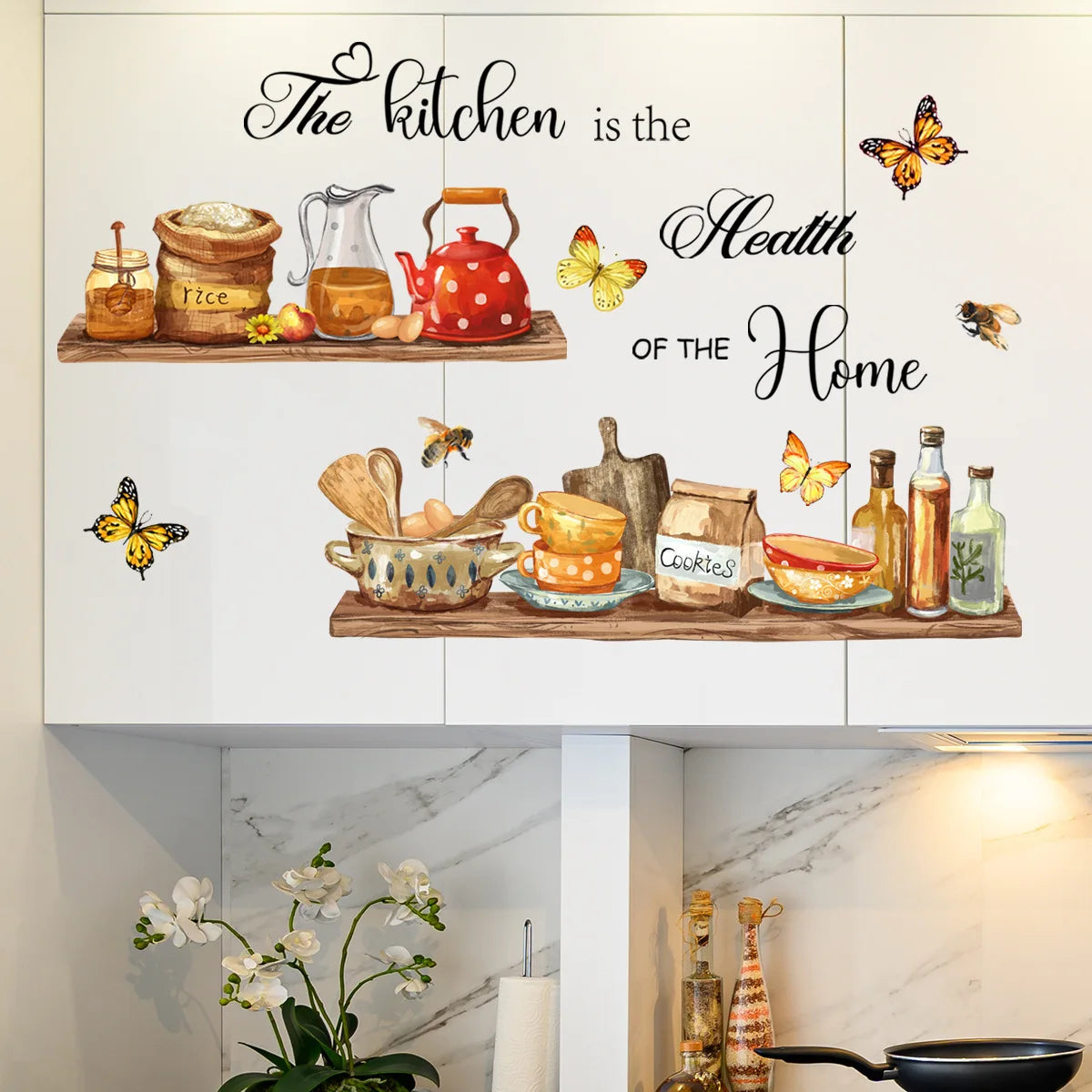 Wall decals featuring butterflies and kitchen decor elements like spices, tea pots, and food items on a white cabinet.
