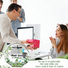 A pink acrylic thank you keepsake with an inspirational message is displayed on a desk.