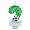 A custom number birthday candle shaped like the number 2, covered in green glitter and topped with a soccer ball decoration.