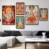 A gallery wall featuring canvas art prints of Hindu deities Ganesha, Shiva, and Parvati in vibrant colors.