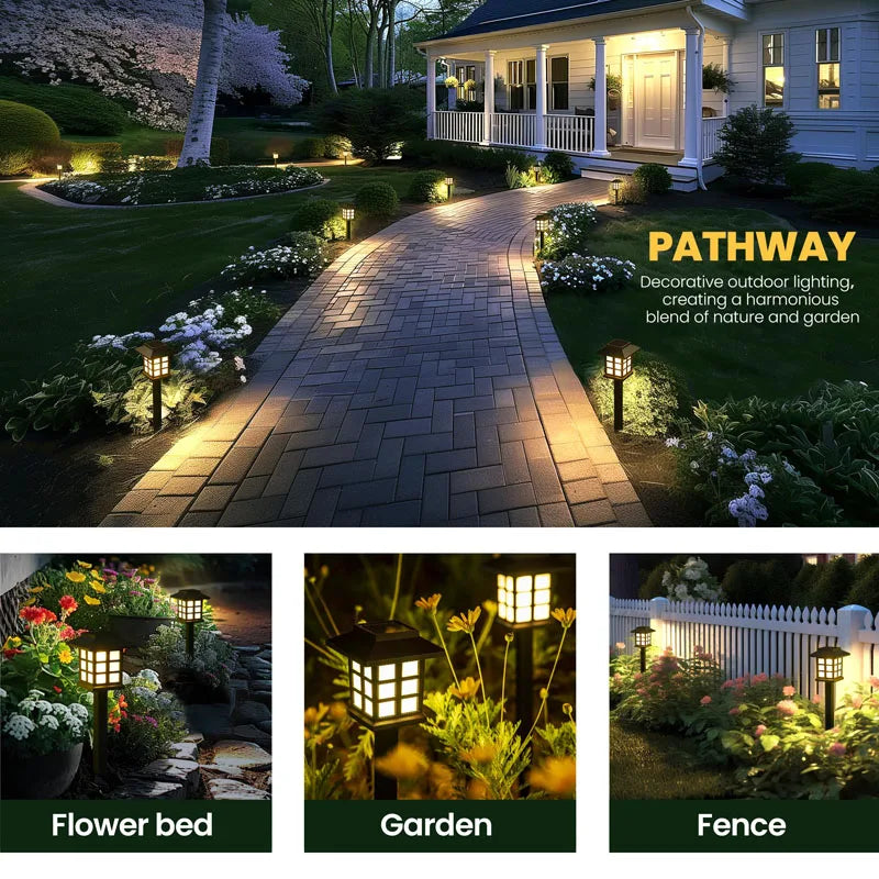 Decorative outdoor pathway lights illuminating a stone walkway leading to a house and garden area.