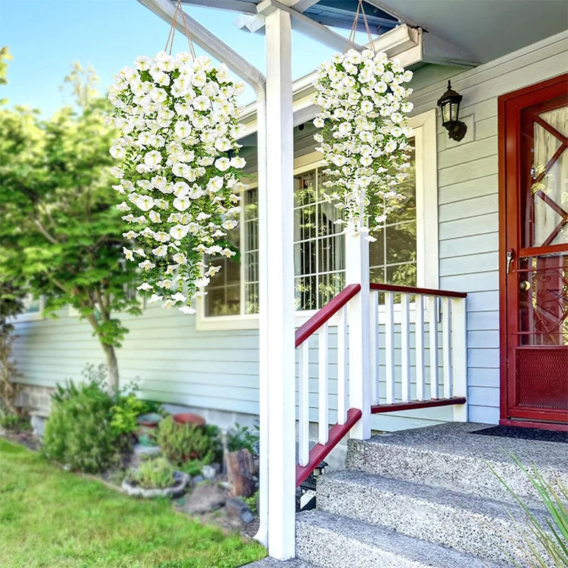 Artificial morning glory hanging vine with white flowers decorating a porch railing