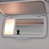 A white vinyl decal featuring a silhouette of Bigfoot's hands on a clear plastic cover.
