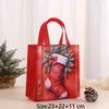 A red non-woven gift tote bag featuring a festive Christmas print of a red and white stocking surrounded by green pine branch