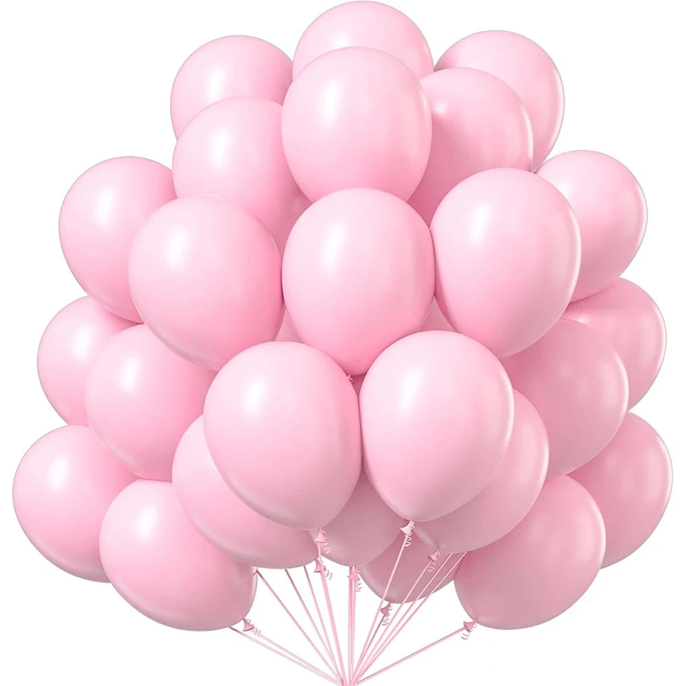 A bunch of pink latex balloons tied together for party decor