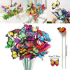 A bouquet of colorful decorative butterflies on thin stakes, featuring vibrant shades of pink, orange, yellow, and blue.