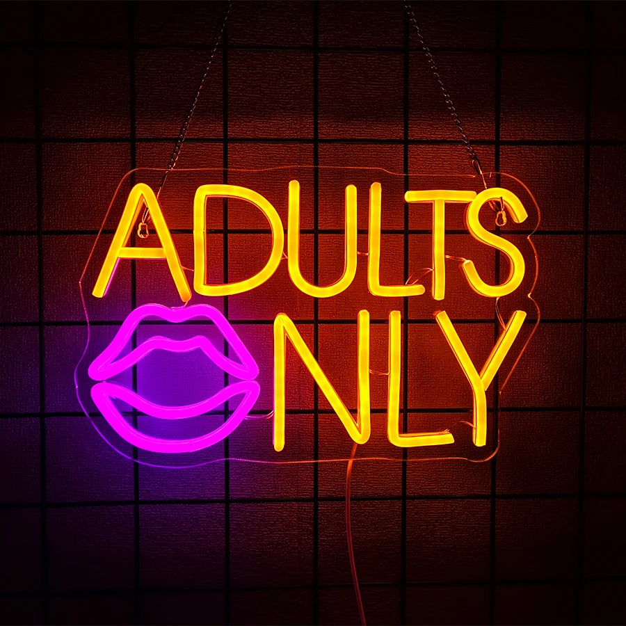 Neon sign spelling out ADULTS ONLY in bright yellow and magenta on a dark grid background.