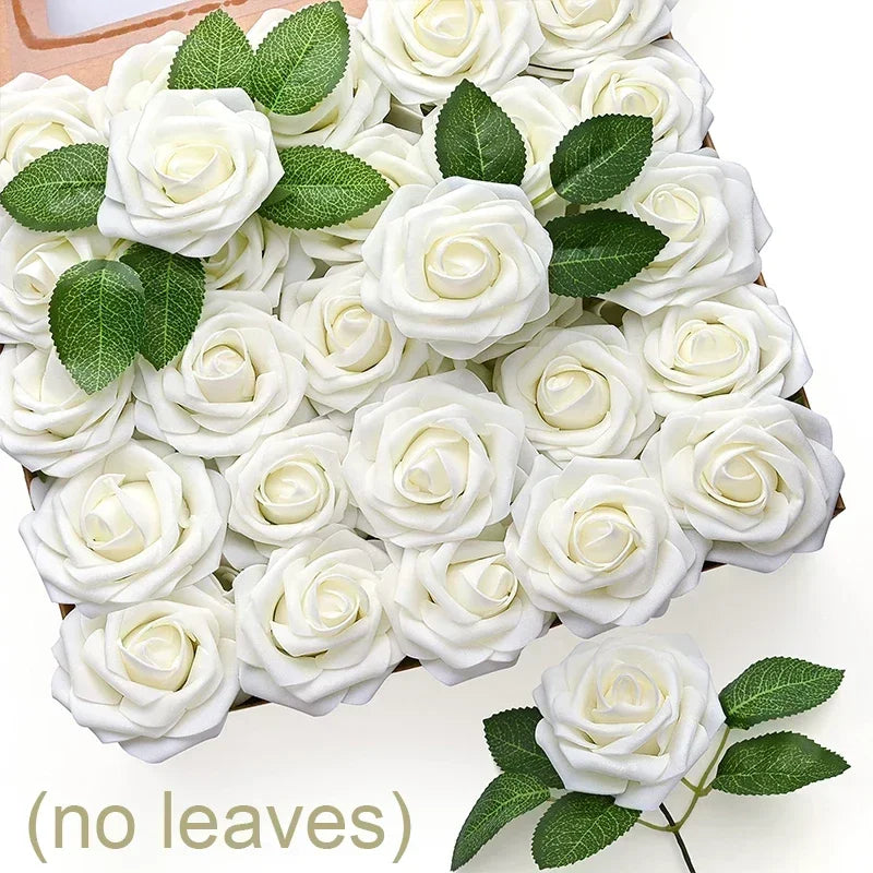 A cluster of white foam rose flower heads with green leaves arranged on a wooden board.