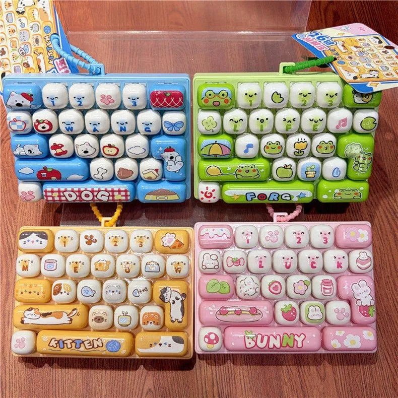 A collection of colorful cartoon animal keycap keychains and fidget toys arranged on a wooden surface.