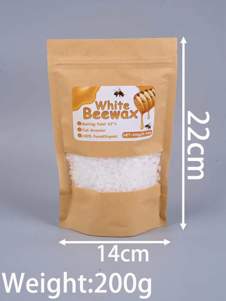 A brown paper bag containing 200g of white beeswax pellets for candle making.