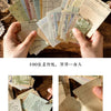 Des feuilles de papier de journaux et de documents anciens et vintage sont tenues dans les mains.