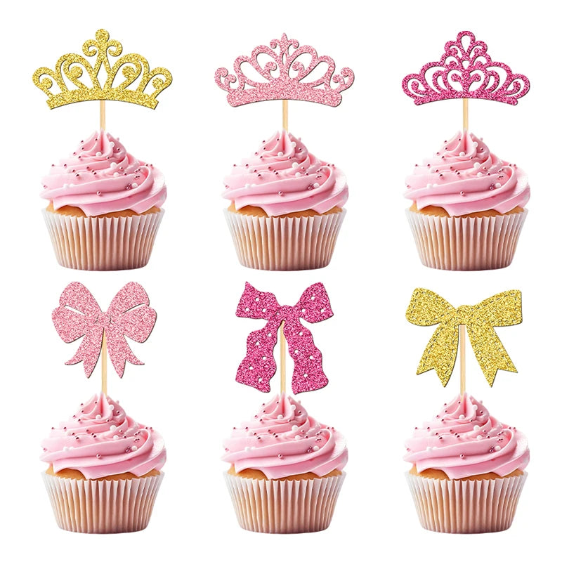 A set of elegant pink and gold crown and bow cupcake toppers displayed on a white background.