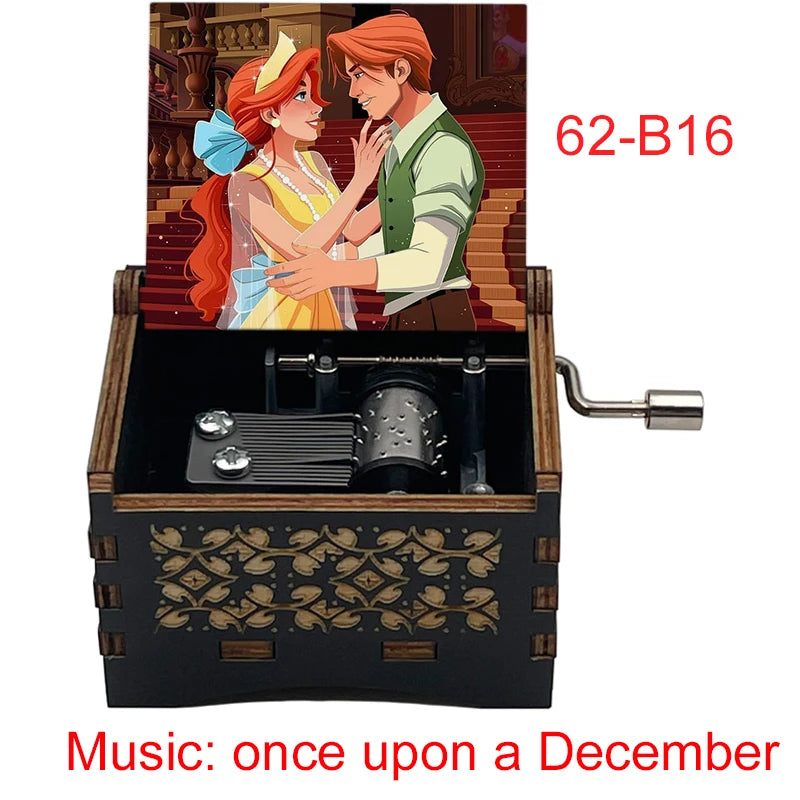 A hand-cranked wooden music box featuring an illustration of two characters, labeled 62-B16.