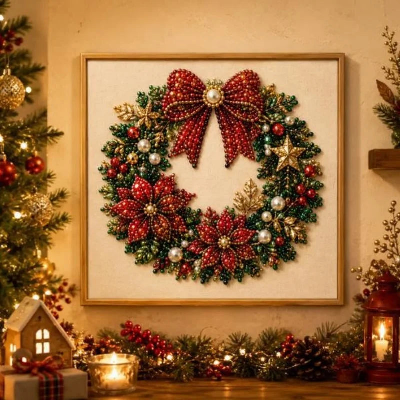 A framed Christmas wreath made of red berries and green foliage decorated with pearls and gold accents.