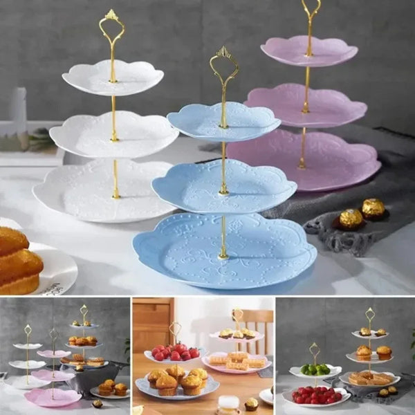 A set of three detachable gold-stemmed tiers in white, light blue, and purple for serving desserts and fruit.