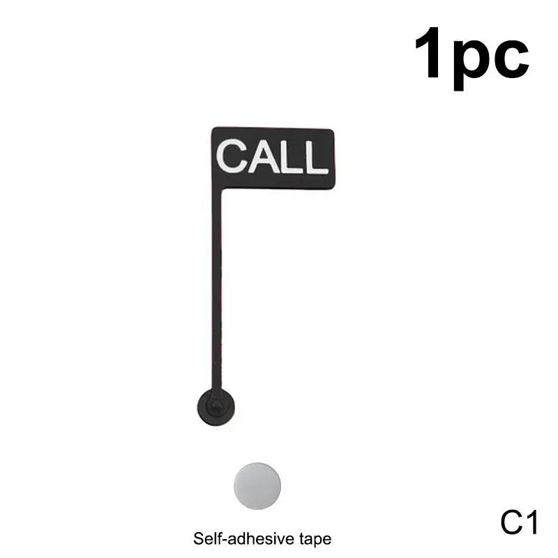 A black desk sign featuring a call indicator and a back off indicator, with self-adhesive tape.