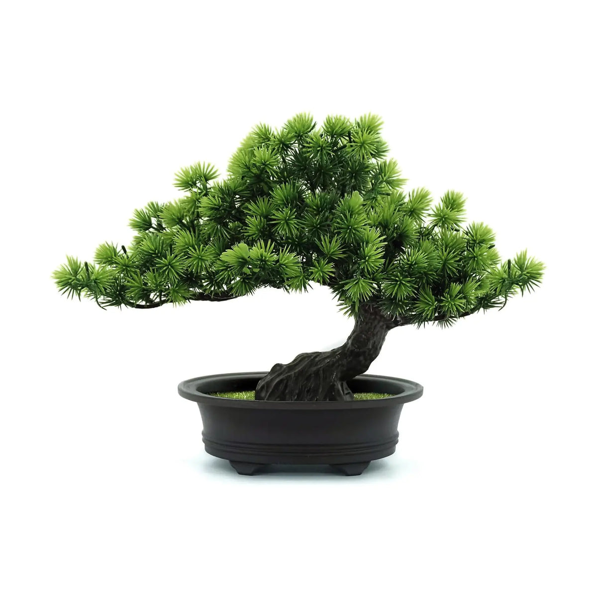 A green artificial bonsai tree with dense foliage planted in a black pot.