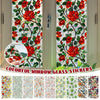 Colorful window glass stickers featuring vibrant red and orange botanical prints on a light background
