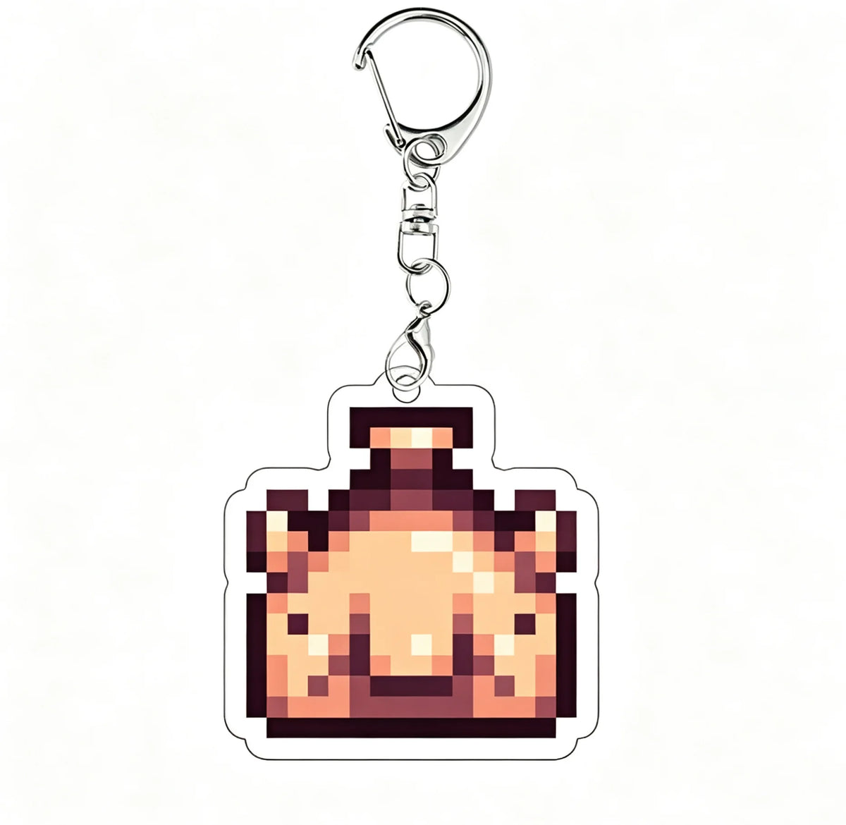 A clear acrylic keychain charm featuring a pixel art depiction of a lion face.