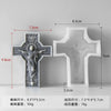 A white silicone mold of a religious Jesus cross with a figure inside, shown next to its dimensions.