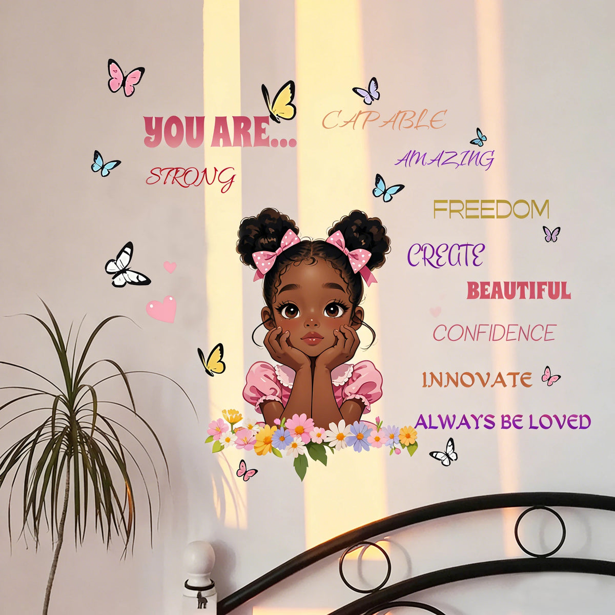 A wall decal featuring butterflies and positive affirmations like you are strong amazing freedom creative beautiful confidenc