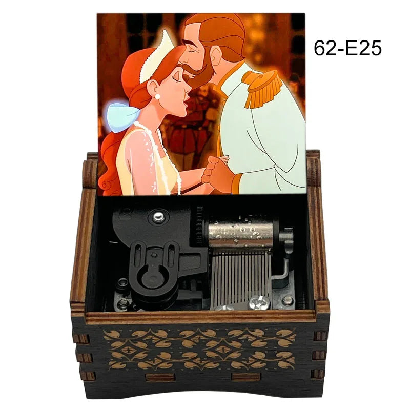 A hand-cranked wooden music box featuring an illustration of a man and woman in profile.