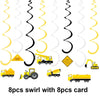 A set of eight yellow and black swirling construction vehicle themed party items including excavators and dump trucks