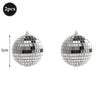 Two silver disco mirror balls, 5cm in diameter, for parties and decor.