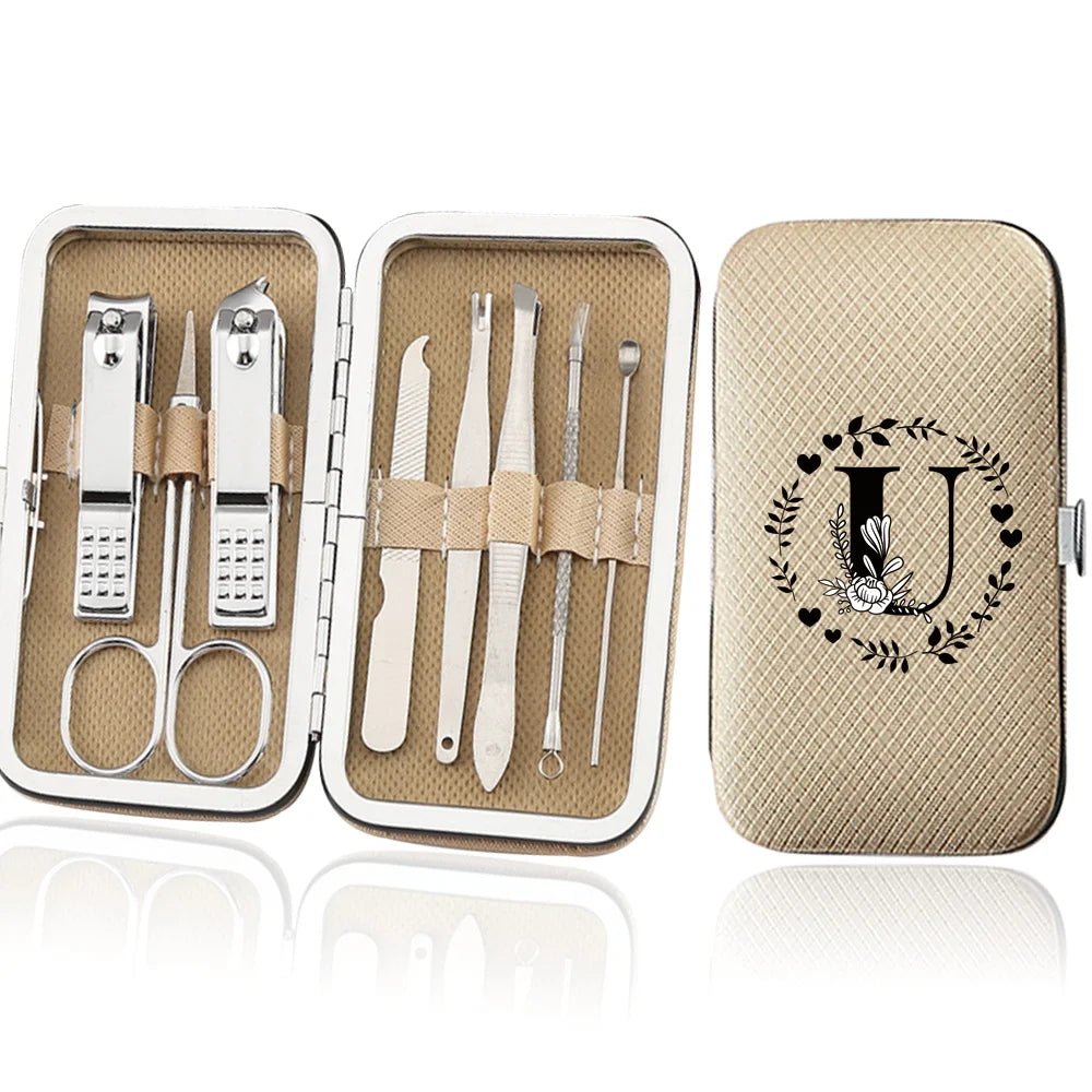 An open leather case displaying an 8-piece stainless steel manicure and pedicure kit with various tools.