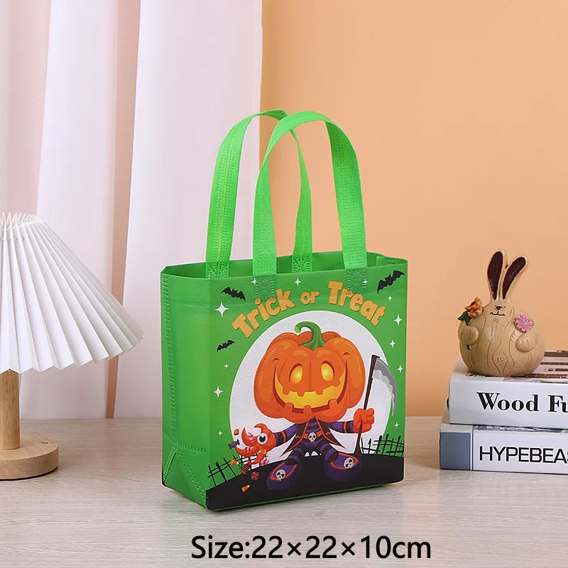 A bright green non-woven gift tote bag with a Halloween pumpkin print and a rabbit design, displayed on a wooden surface.