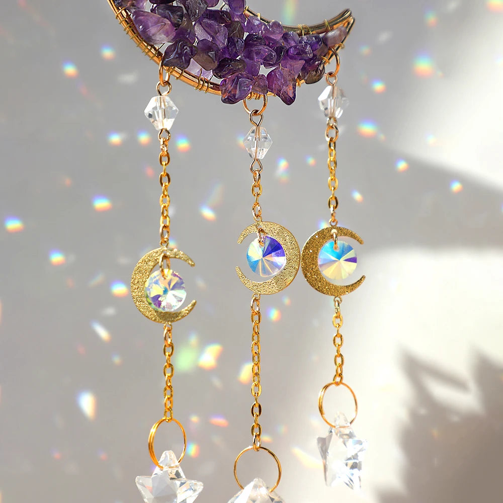 Handcrafted moon crystal suncatcher featuring purple crystals and gold prism pendants