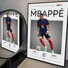A framed poster featuring Kylian Mbappé in a blue jersey and shorts, with minimalist typography.