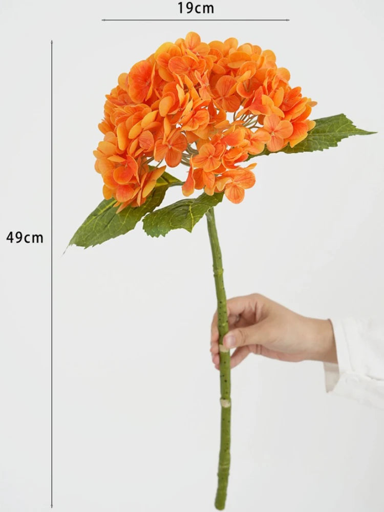 Orange hydrangea silk flower branches on a green stem with measurements shown.