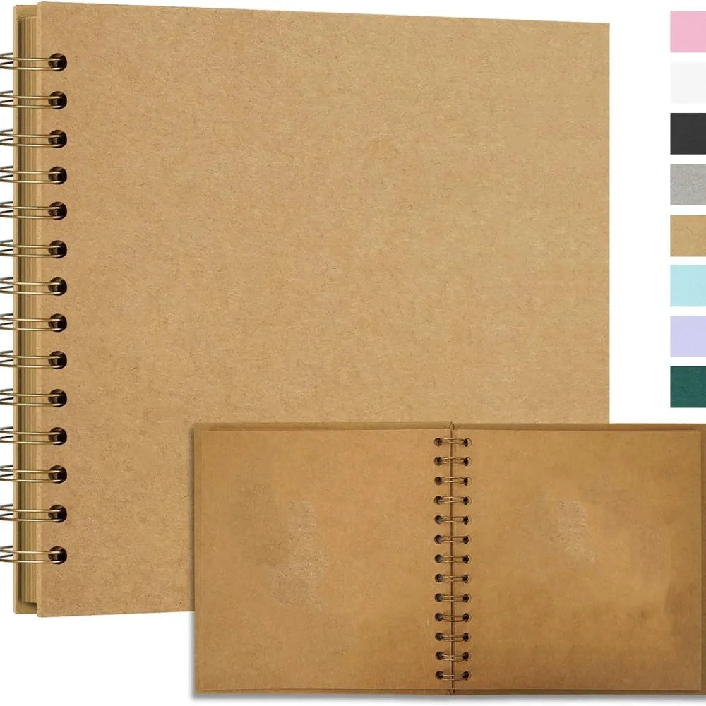 A light brown handmade kraft paper scrapbook with a spiral binding and a matching blank page.