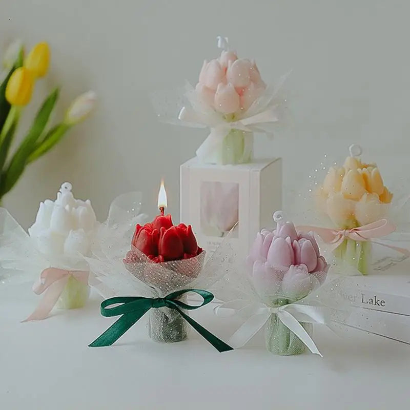 A display of artisan tulip bouquets in various pastel colors, including pink and yellow, set against a white background.