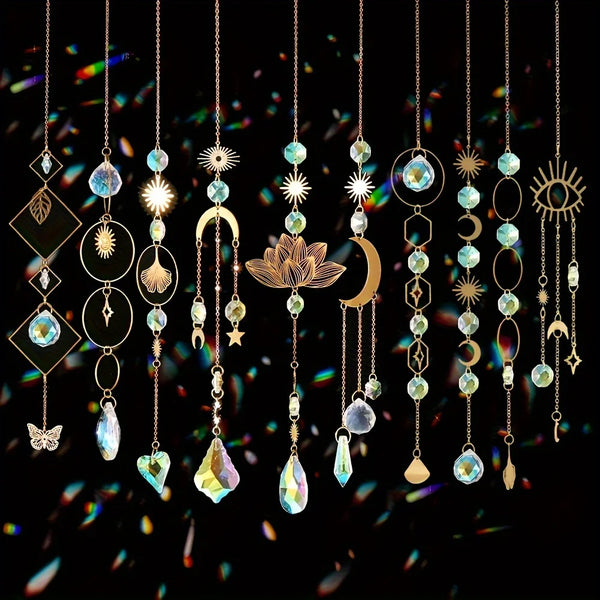 A set of hanging crystal charms and pendants featuring various colored gemstones like blue, green, and yellow.