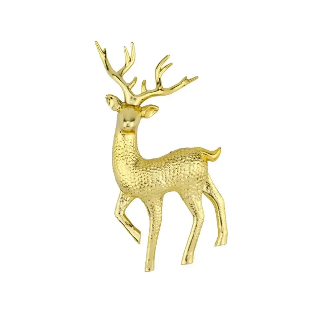 A golden deer head with antlers, an elegant bride and groom cake topper.