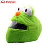 A bright green cartoon plush toy with large eyes and an orange nose, designed as a helmet cover.