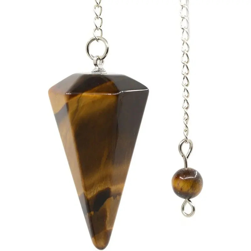 A natural stone teardrop pendant with brown and black swirling patterns suspended by a silver chain.