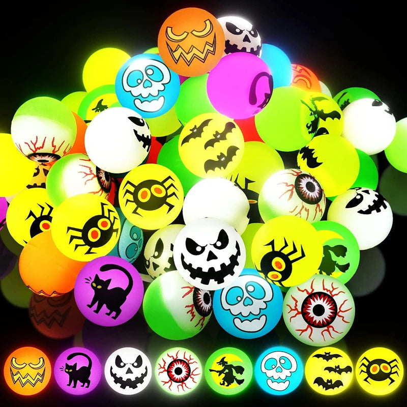 A collection of ten glow-in-the-dark Halloween themed bouncing balls featuring skulls, bats, and other spooky faces.