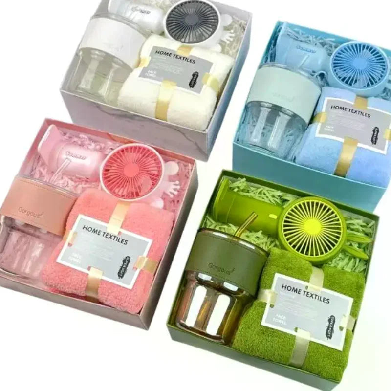 A gift set containing a tumbler, towel, and UPF sun protection in various colors and packaging.