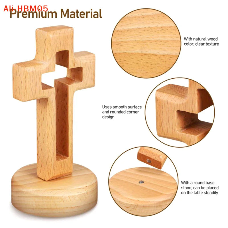 A handcrafted wooden cross standing ornament with a smooth surface and rounded corner design.